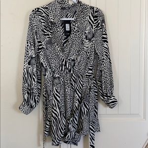 Zebra print romper (Never worn)